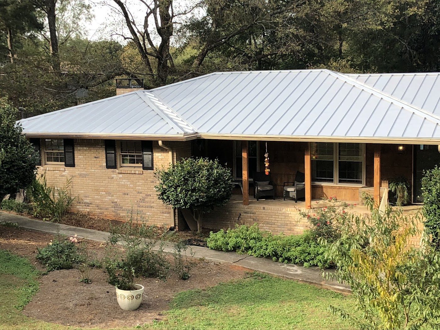 Metal roof on a brick ranch